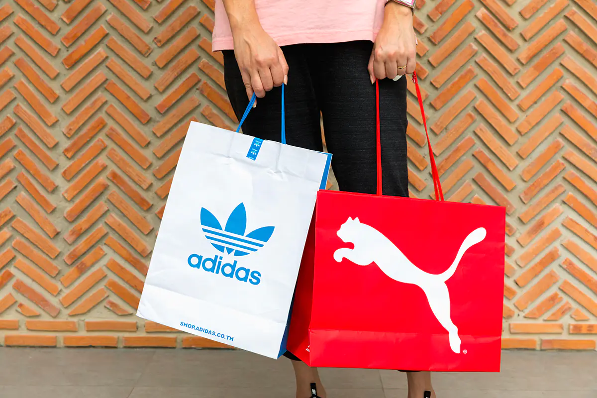 Puma in crisi, torna l’ipotesi di fusione con Adidas